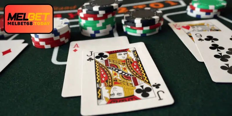 Blackjack table with dealer cards and player chips during gameplay